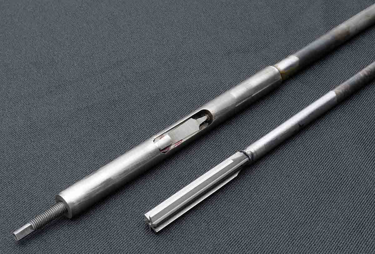 Pictured is a rifling head (top), adjustable for precision cutting depth, and a reamer (bottom).